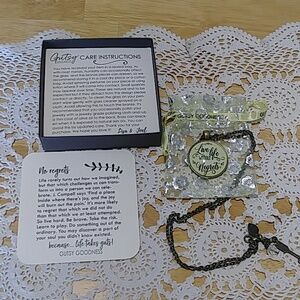 Antiqued look necklace with pretty carry bag and box